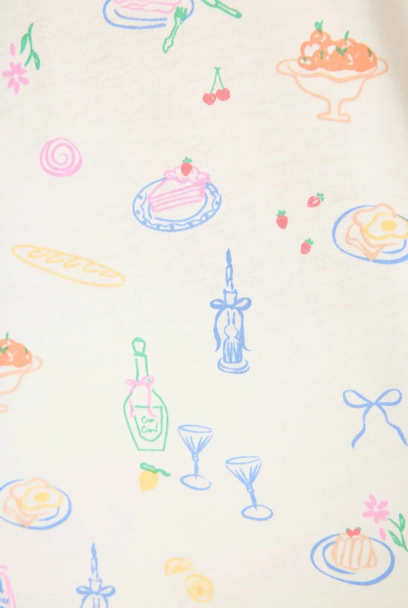 Colorful food and drink illustrations on the fabric of the PJ Salvage Whimsy Button Up & Short Short Set.