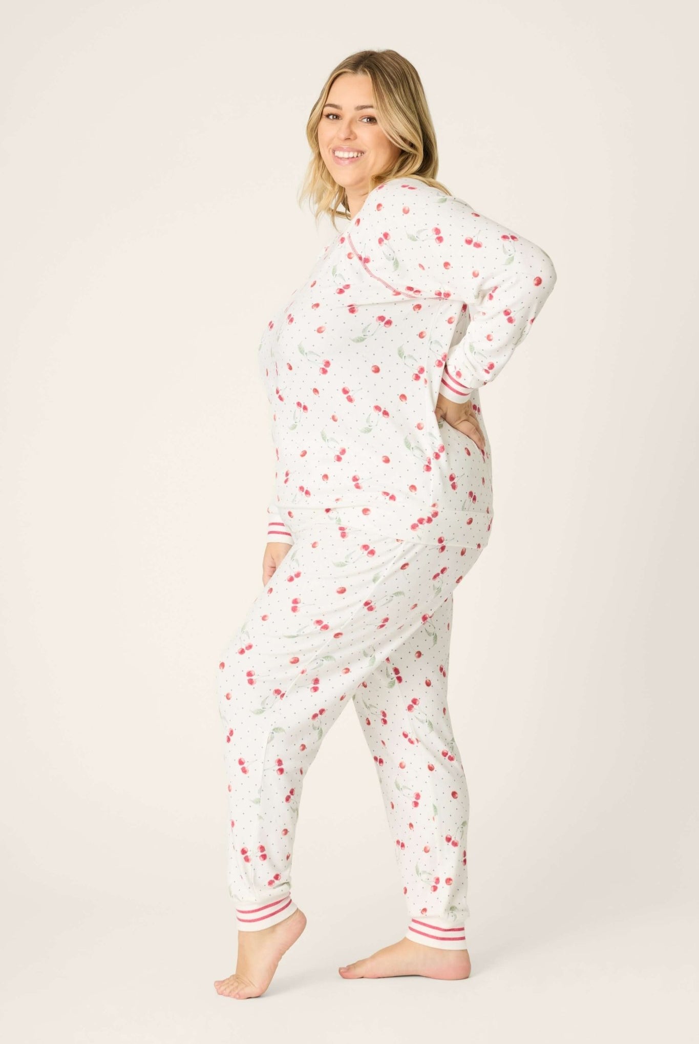 Polka Dot Cherries Peachy Jersey Pajama Set PJ Salvage model showcasing style and comfort in a playful cherry and polka dot print.