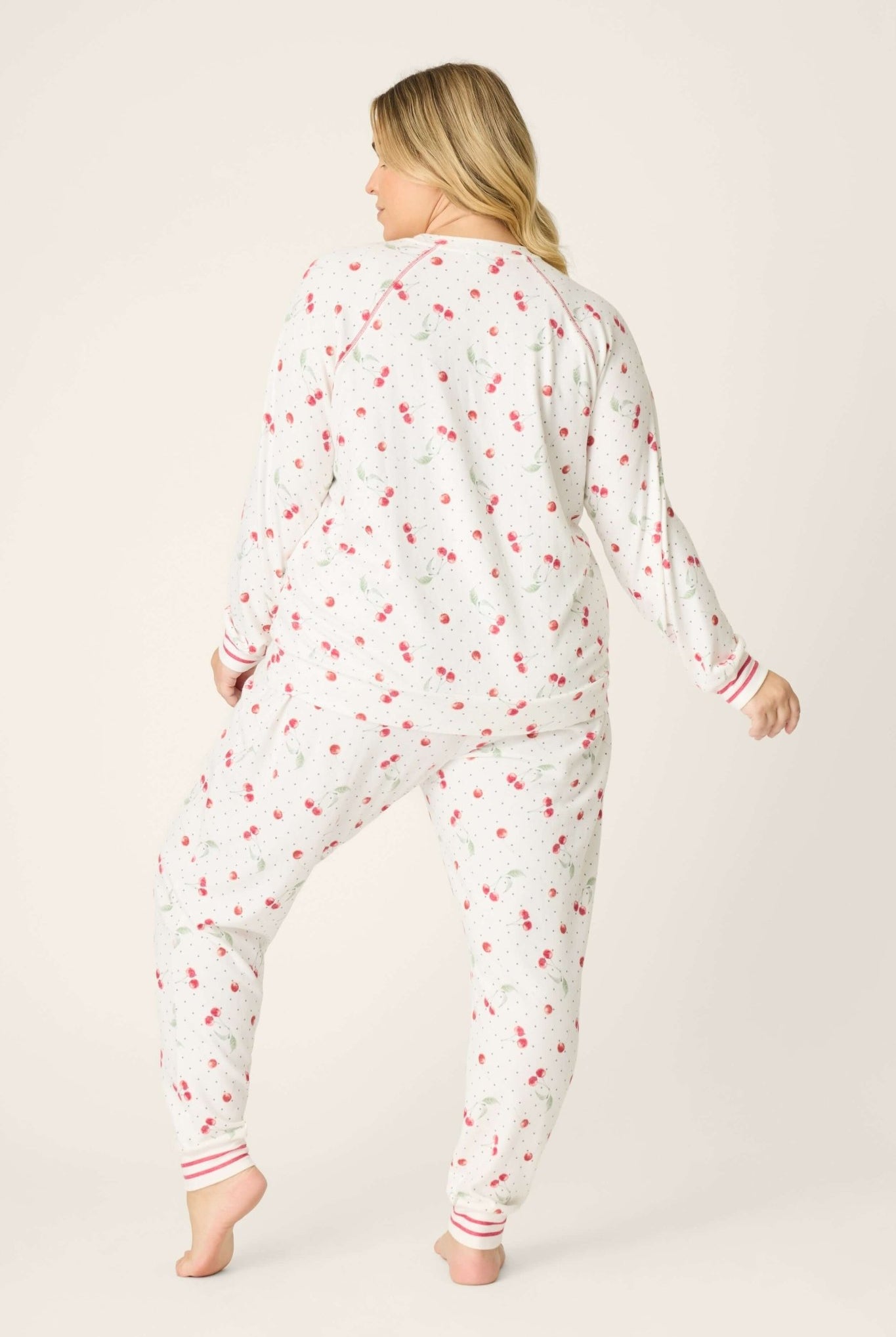 Polka Dot Cherries Peachy Jersey Pajama Set PJ Salvage back view with cherry print and striped cuffs.