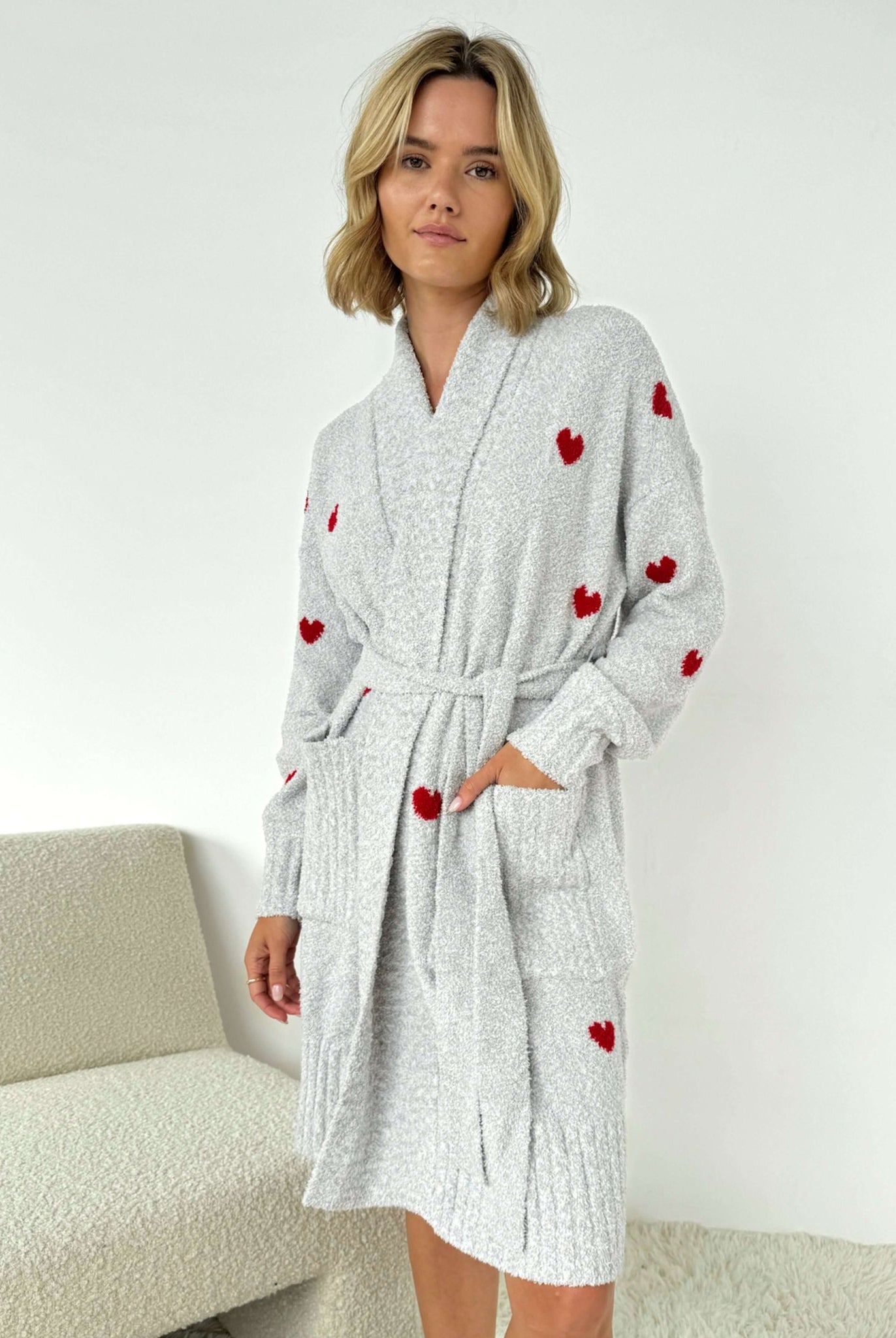 Model wearing the Pomona Fuzzy Yarn Robe Splendid in gray with red hearts