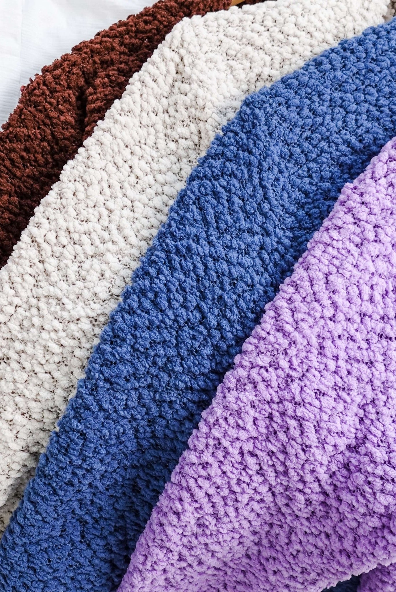 all-groups Colour Options for the popcorn summer cardigan. The colour options are brown, beige, blue and purple.