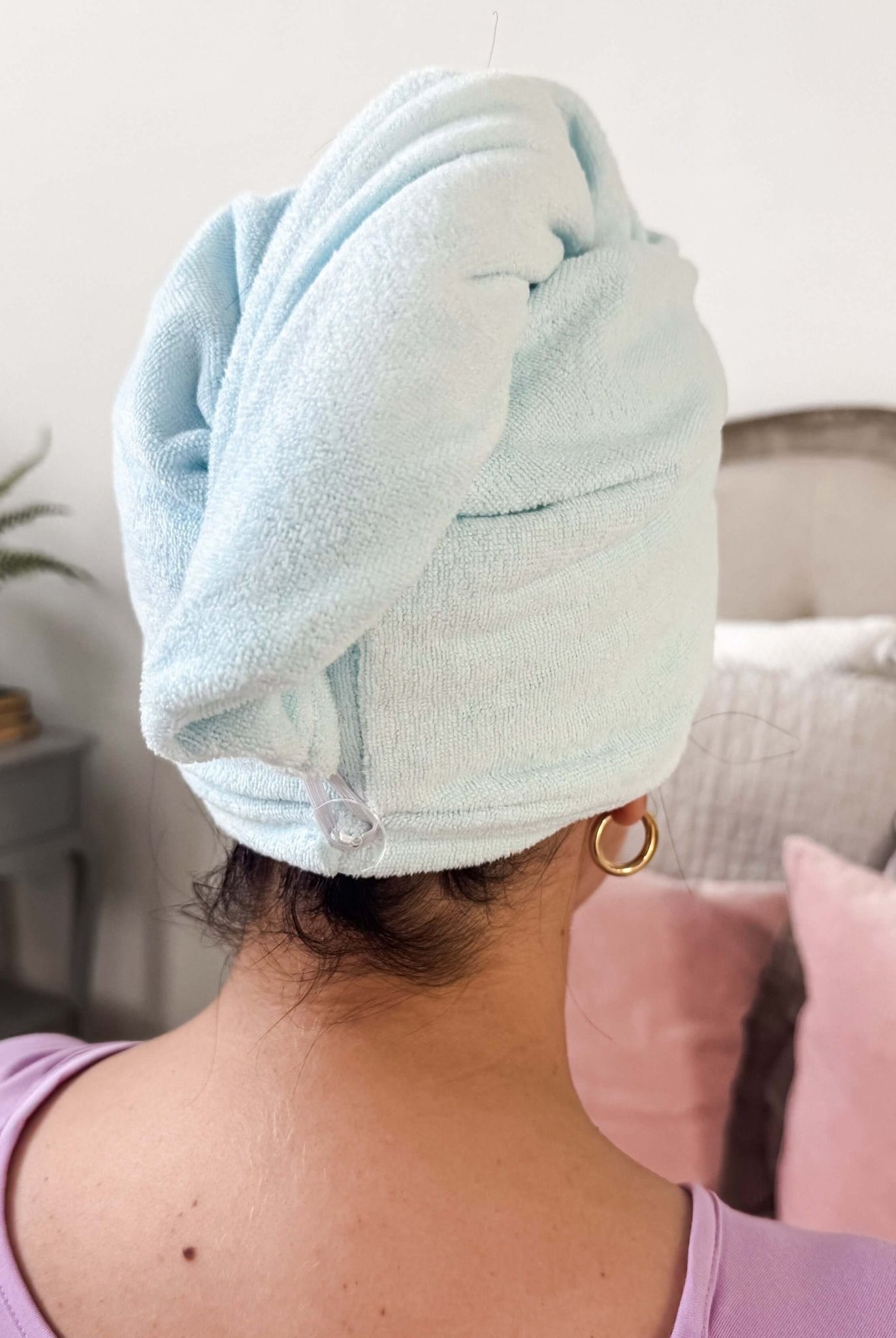 Remove It Quick Dry Microfiber Hair Towel Wrap in use, showcasing its quick-dry feature and sleek design.
