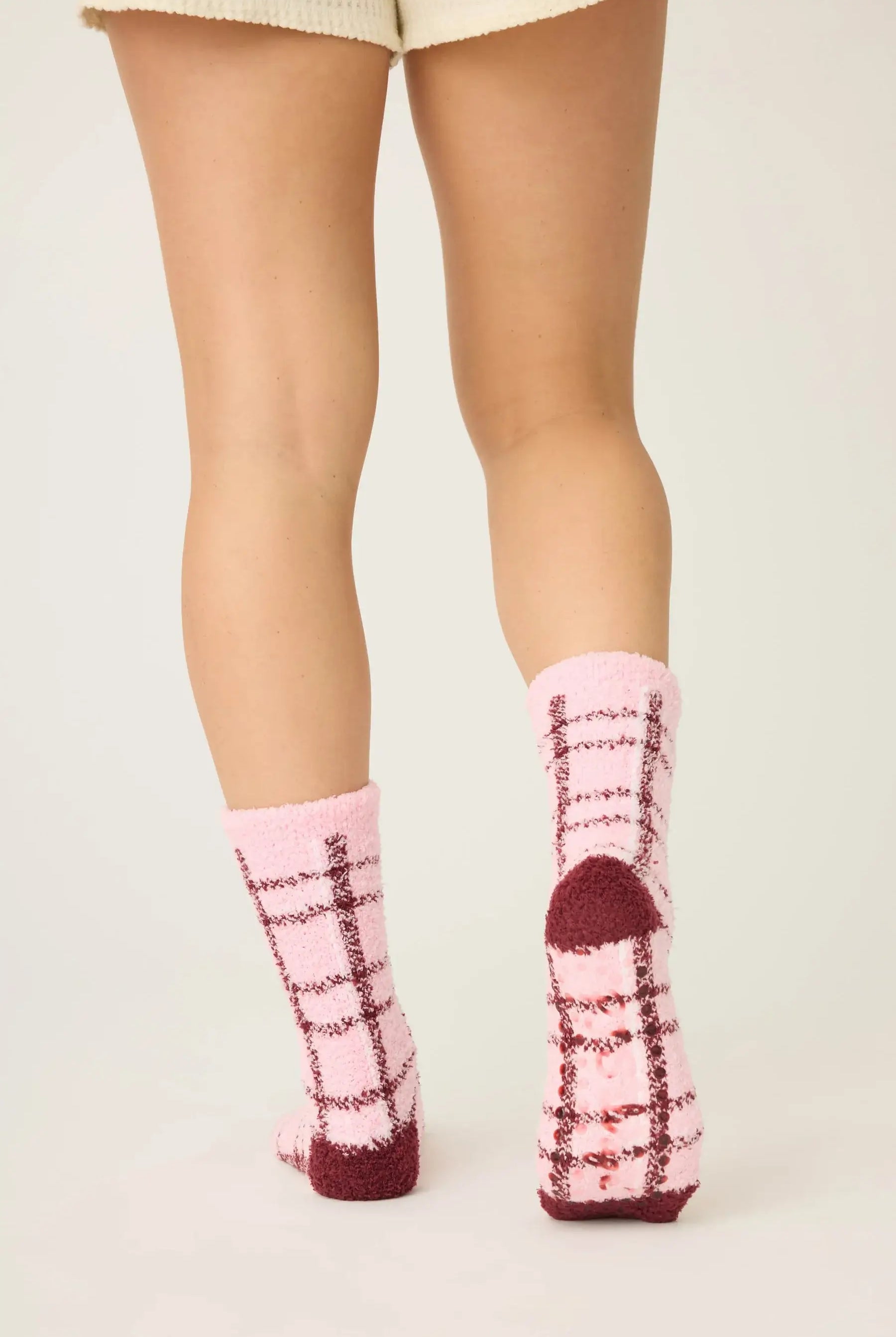 Pair of PJ Salvage Pink & Burgundy Plaid Fuzzy Crew Socks showing the cheerful pattern and plush texture.