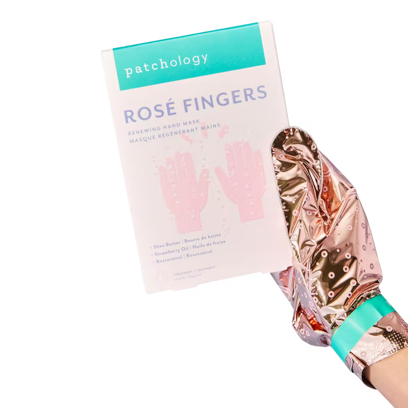 Rose gold hand mask with packaging labeled 'Patchology Rosé Fingers' on a white background, Patchology Rosé Fingers renewing hand mask rose gold gloves shea butter