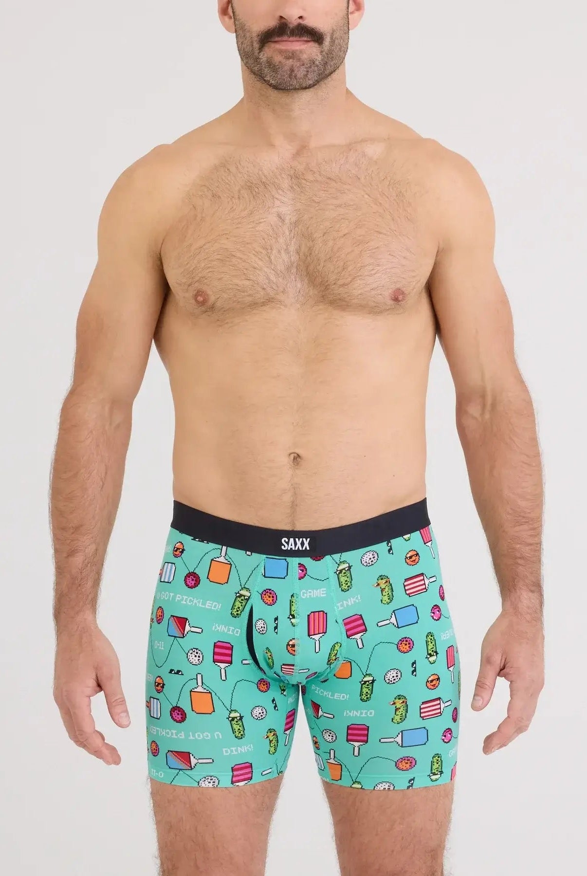 Model wearing Vibe Xtra Soft Comfort Boxer Brief in playful print featuring ice cream and drinks.