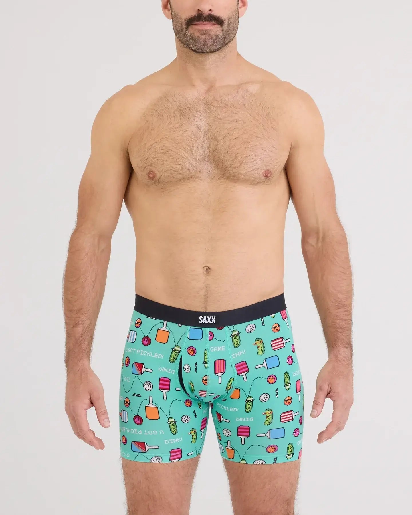 Model wearing Vibe Xtra Soft Comfort Boxer Brief in playful print featuring ice cream and drinks.