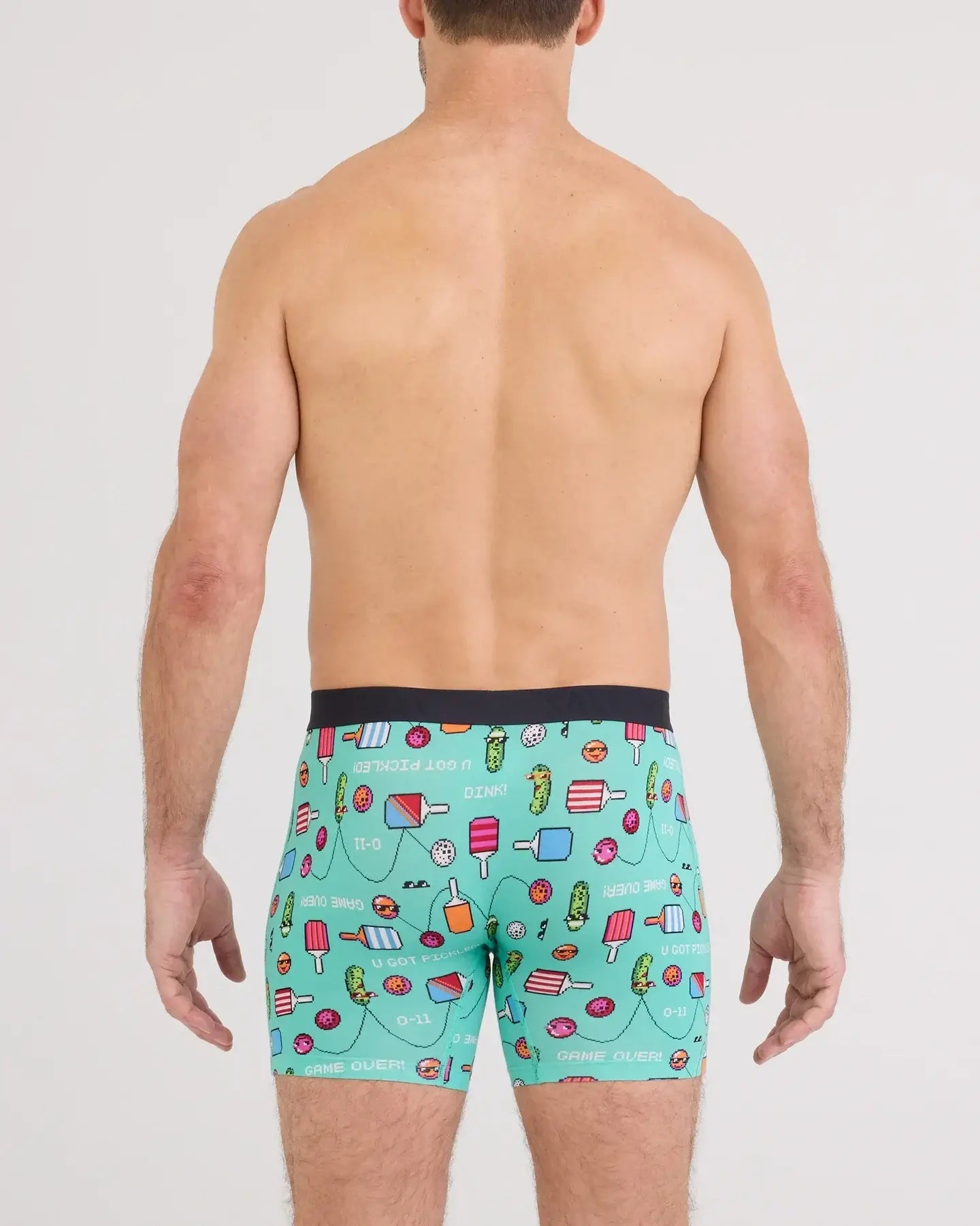 Back view of a man wearing Vibe Xtra Soft Comfort Boxer Brief with colorful food-themed prints.