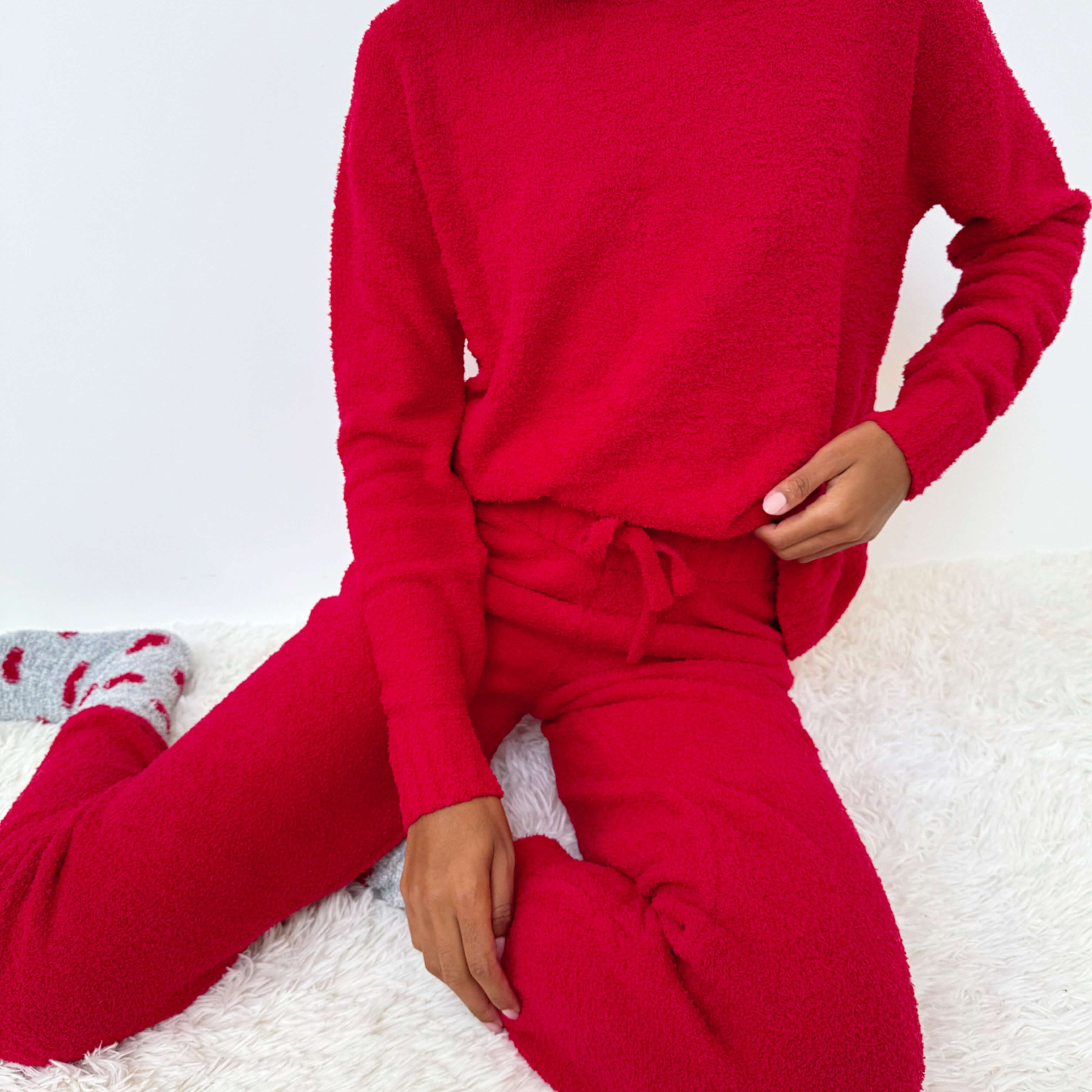 Woman wearing Cloud-Soft Fuzzy Sweater Pajama Set Splendid in vibrant red, showcasing ultimate comfort and style.