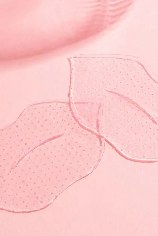 Served Chilled Rosé Lips Gels hydrogel masks on pink background for a refreshing lip treatment.