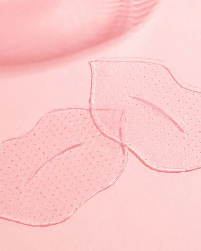 Served Chilled Rosé Lips Gels hydrogel masks on pink background for a refreshing lip treatment.