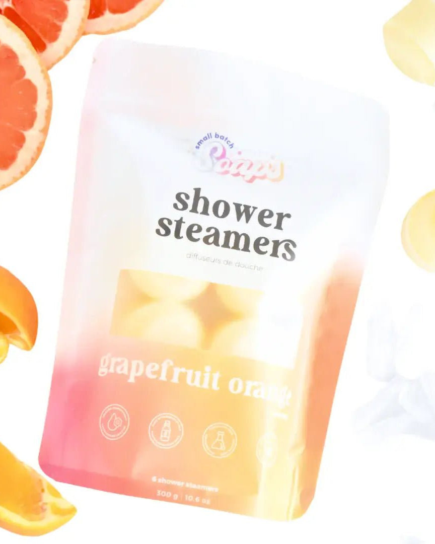Shower Steamer 2pk Grapefruit Orange packaging with grapefruit and orange slices surrounding it