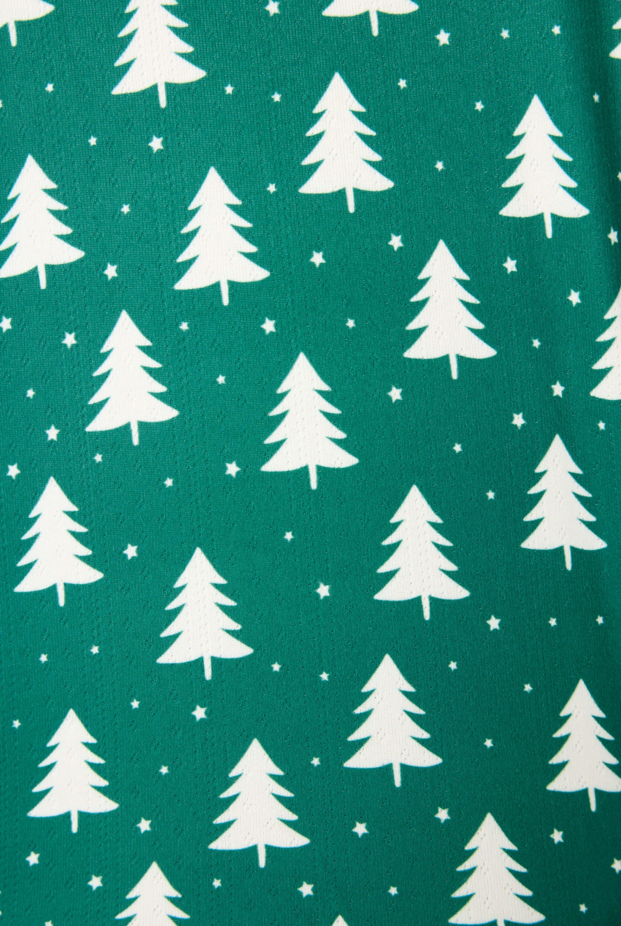 Pattern of white Christmas trees on a forest green background, perfect for the Silent Night PJ Set.