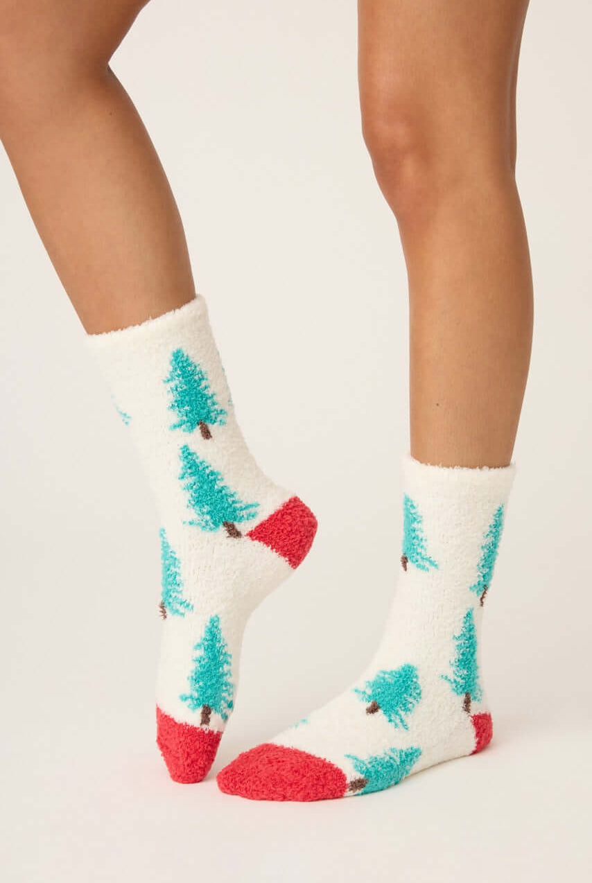 Pair of PJ Salvage "Sleigh All Day" Fuzzy Cozy Socks in ivory with green tree print and red heel
