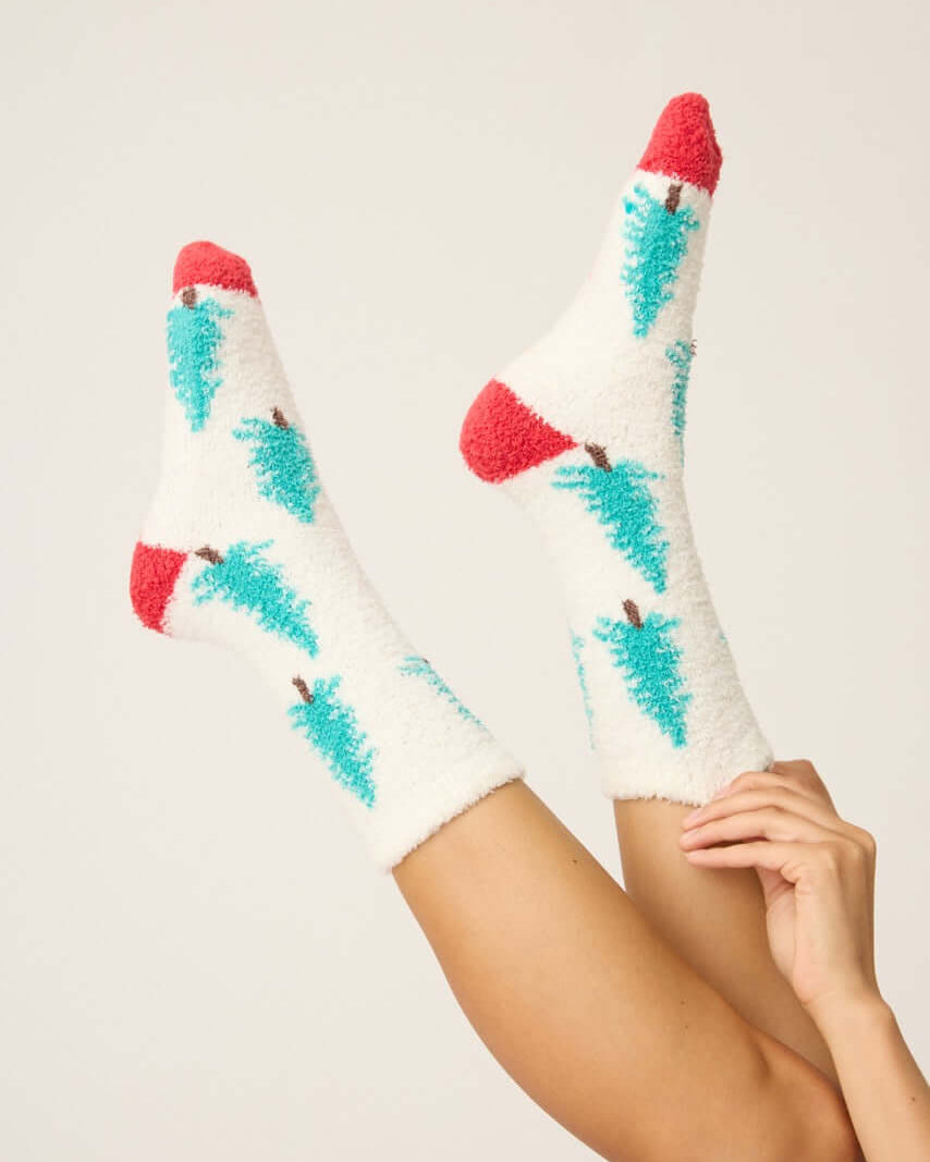 Pair of PJ Salvage "Sleigh All Day" Fuzzy Cozy grippy Socks in ivory with green tree print and red heel