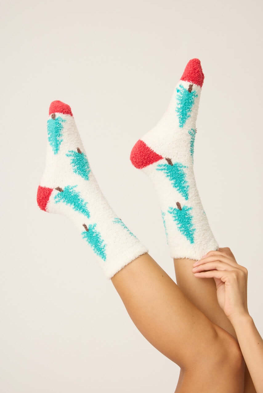 Pair of PJ Salvage "Sleigh All Day" Fuzzy Cozy grippy Socks in ivory with green tree print and red heel