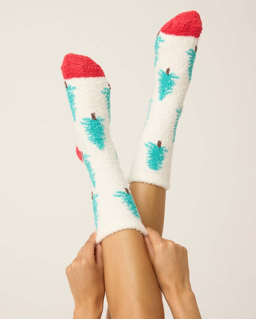 Sleigh All Day Socks featuring tree print and cozy grippers, perfect for winter comfort by PJ Salvage.