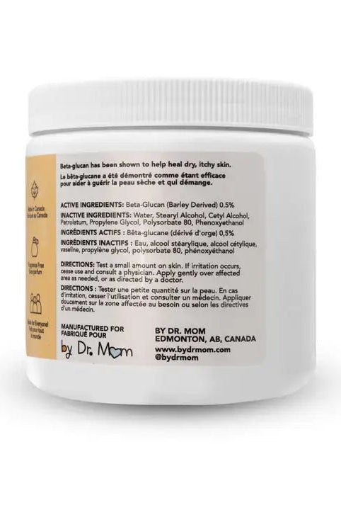 White jar of beta glucan cream with label on a white background