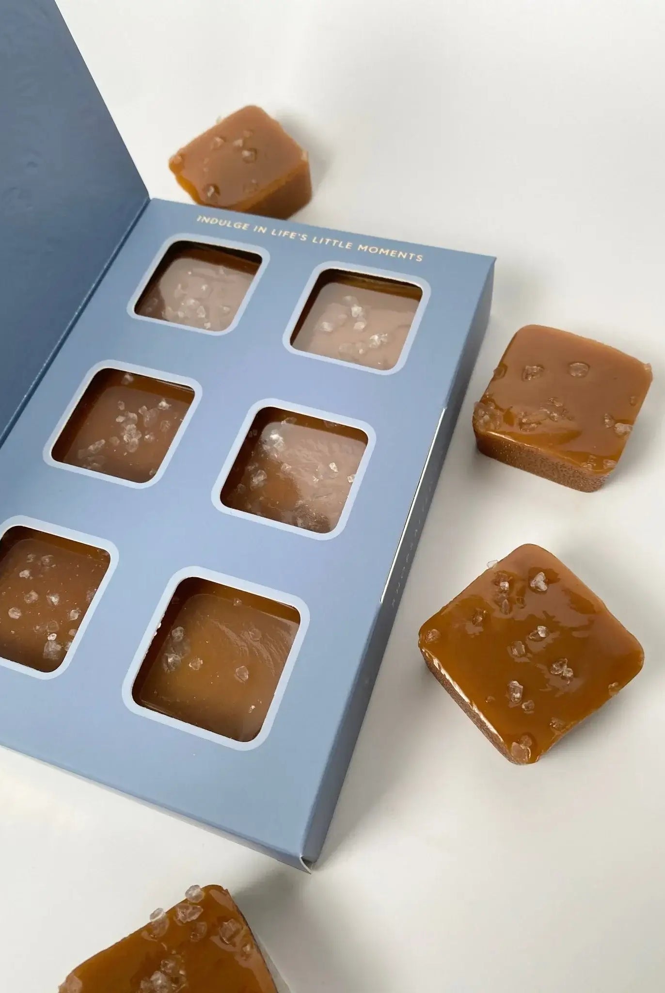 6-piece box of traditional salted caramels in blue gift box