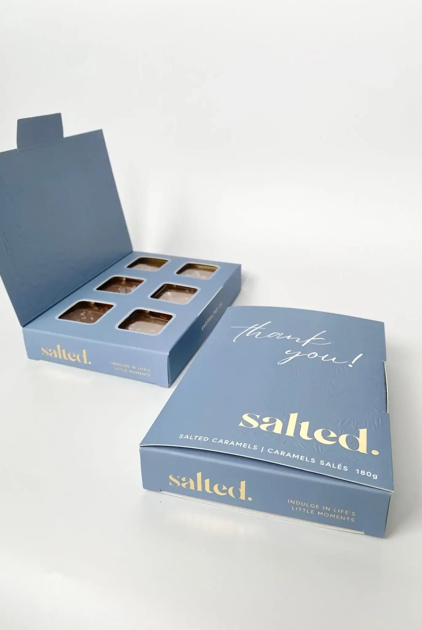 6-piece box of traditional salted caramels in blue gift box