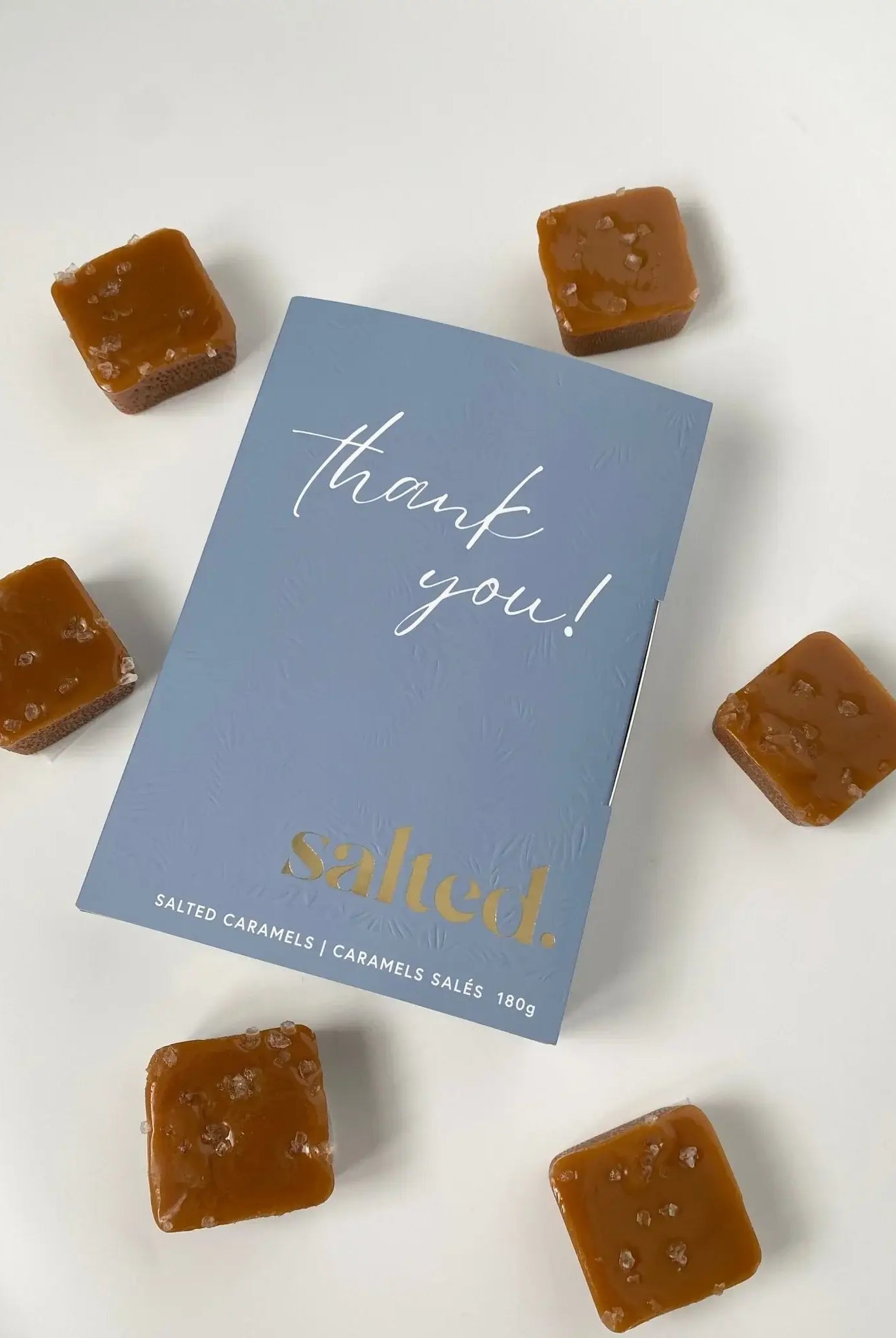 6-piece box of traditional salted caramels in blue gift box