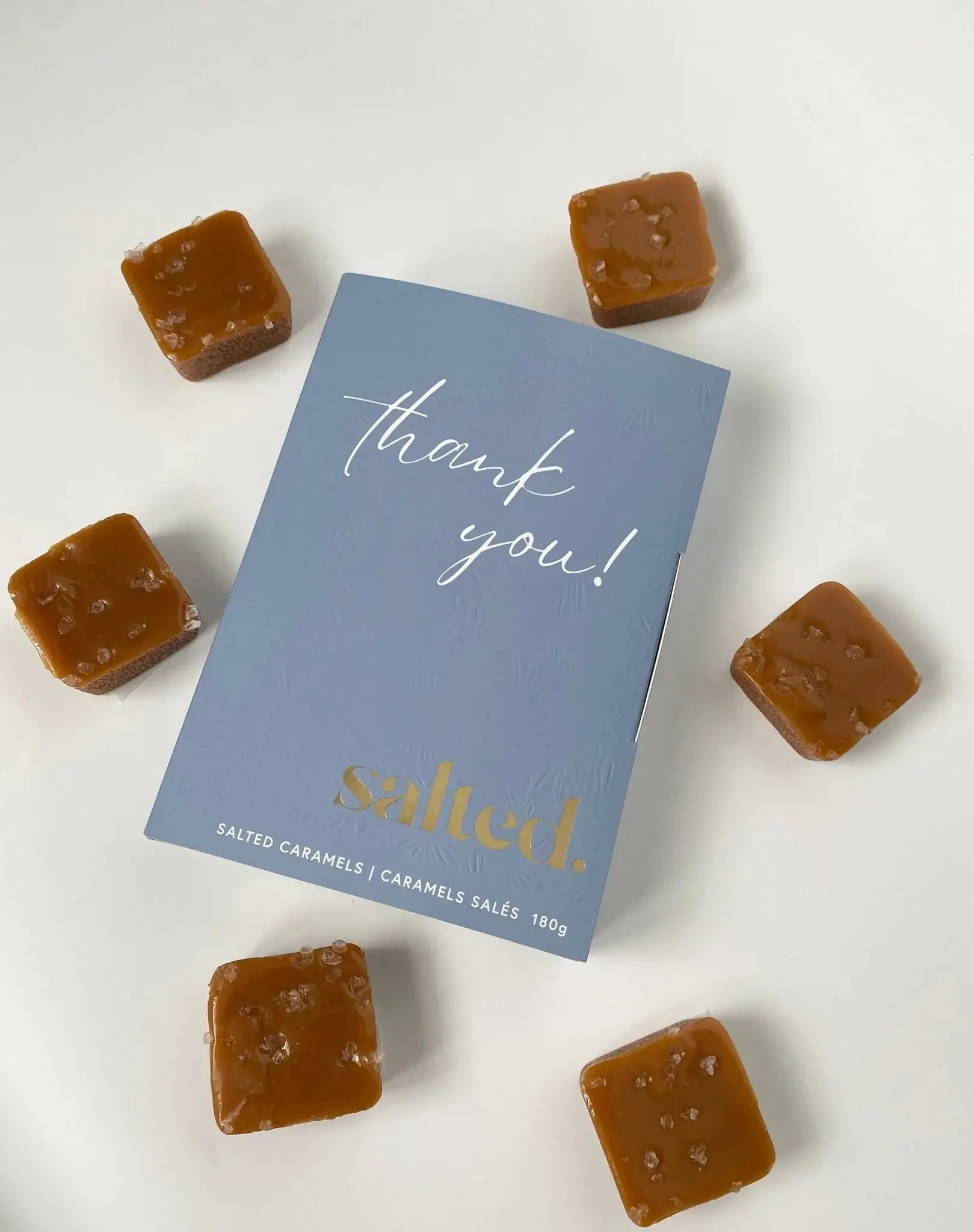 6-piece box of traditional salted caramels in blue gift box