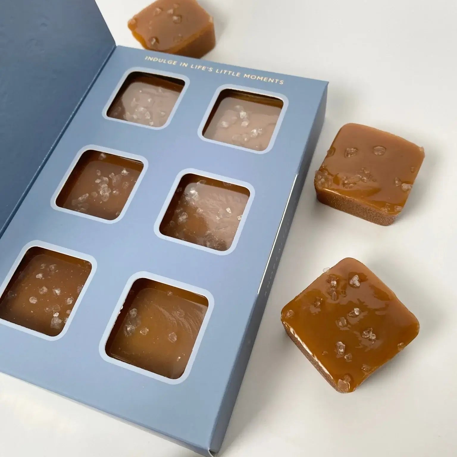 6-piece box of traditional salted caramels in blue gift box