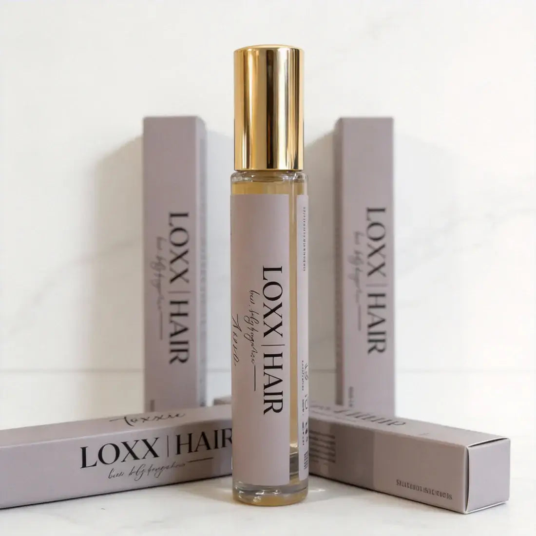 LOXX Toxxic Hair & Body Fragrance – 10mL travel size bottle with packaging on a white background.