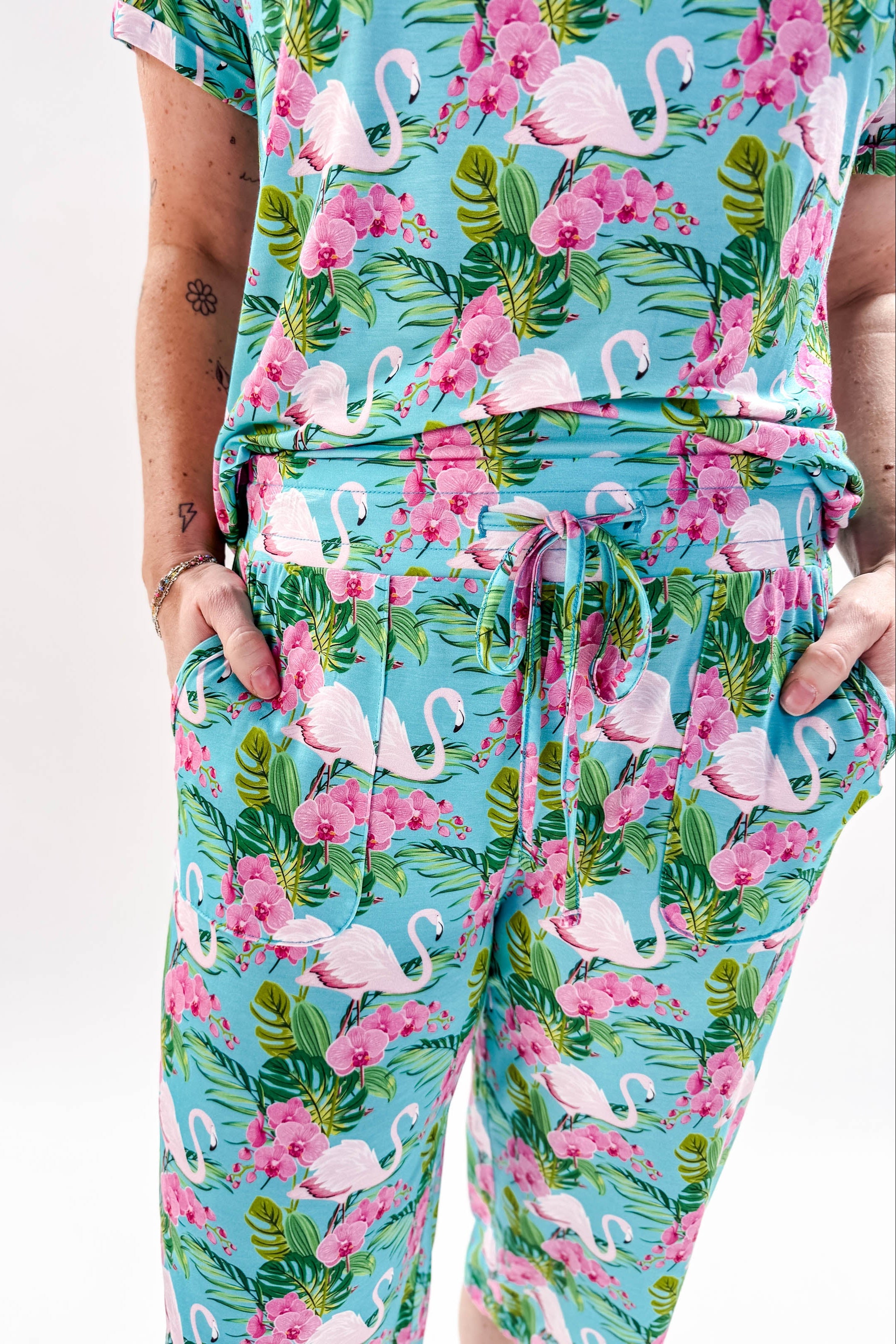 Tropic Like It's Hot Print Tee & Capri Bamboo PJ Set | GEORGIA RYLAN women's loungewear or pyjama set in a tropical flamingo print, classic tee shirt and capri set, close up of drawstring and pockets