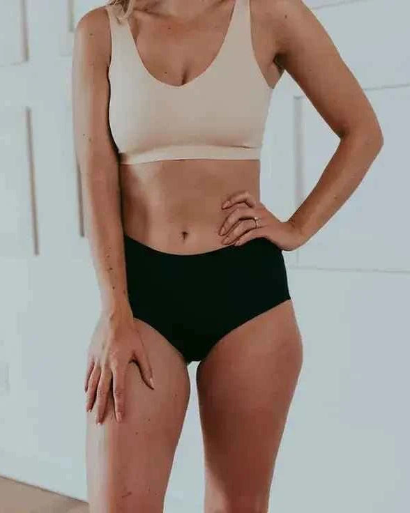 Katie Em Undies Ultimate Seamless Mid Rise Brief black front view on model — Cloud Nine Pajamas Edmonton