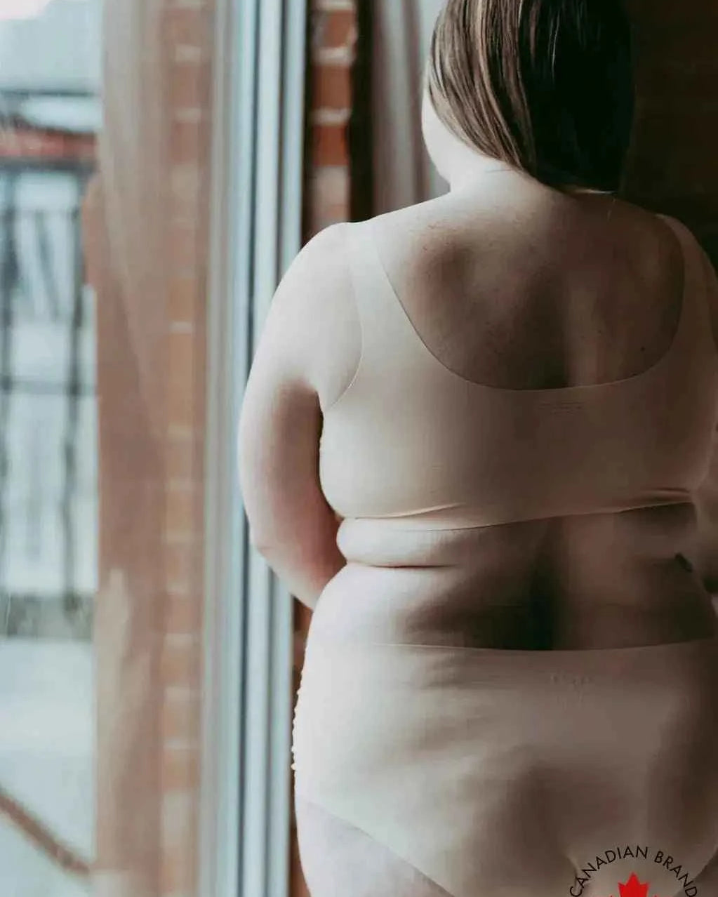 Katie Em Undies Ultimate Seamless Wireless Bra nude, back view on model — Cloud Nine Pajamas Edmonton