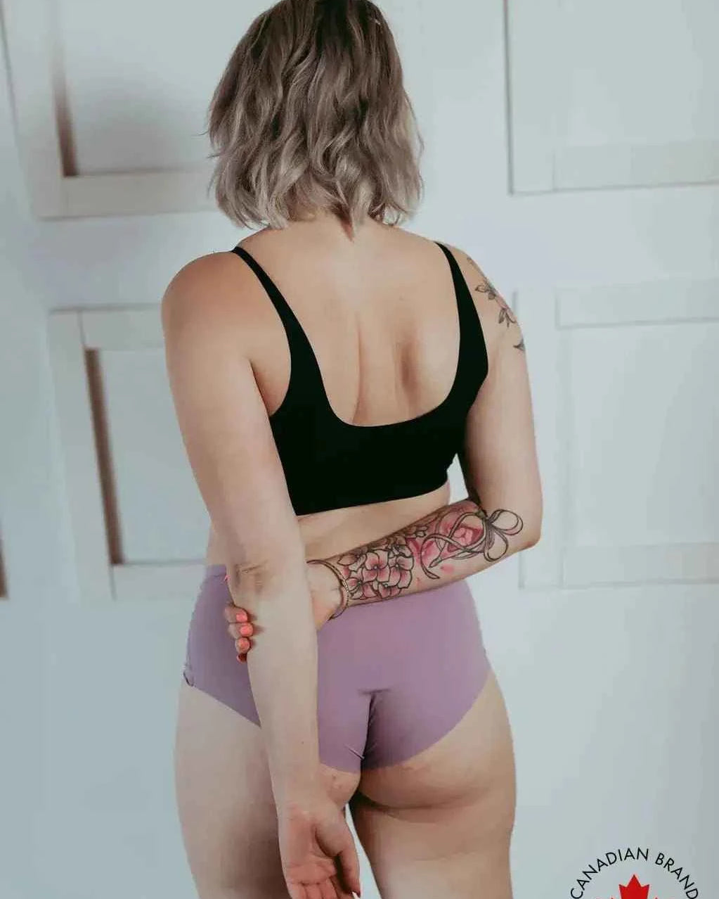 Katie Em Undies Ultimate Seamless Wireless Bra black on model back view — Cloud Nine Pajamas Edmonton