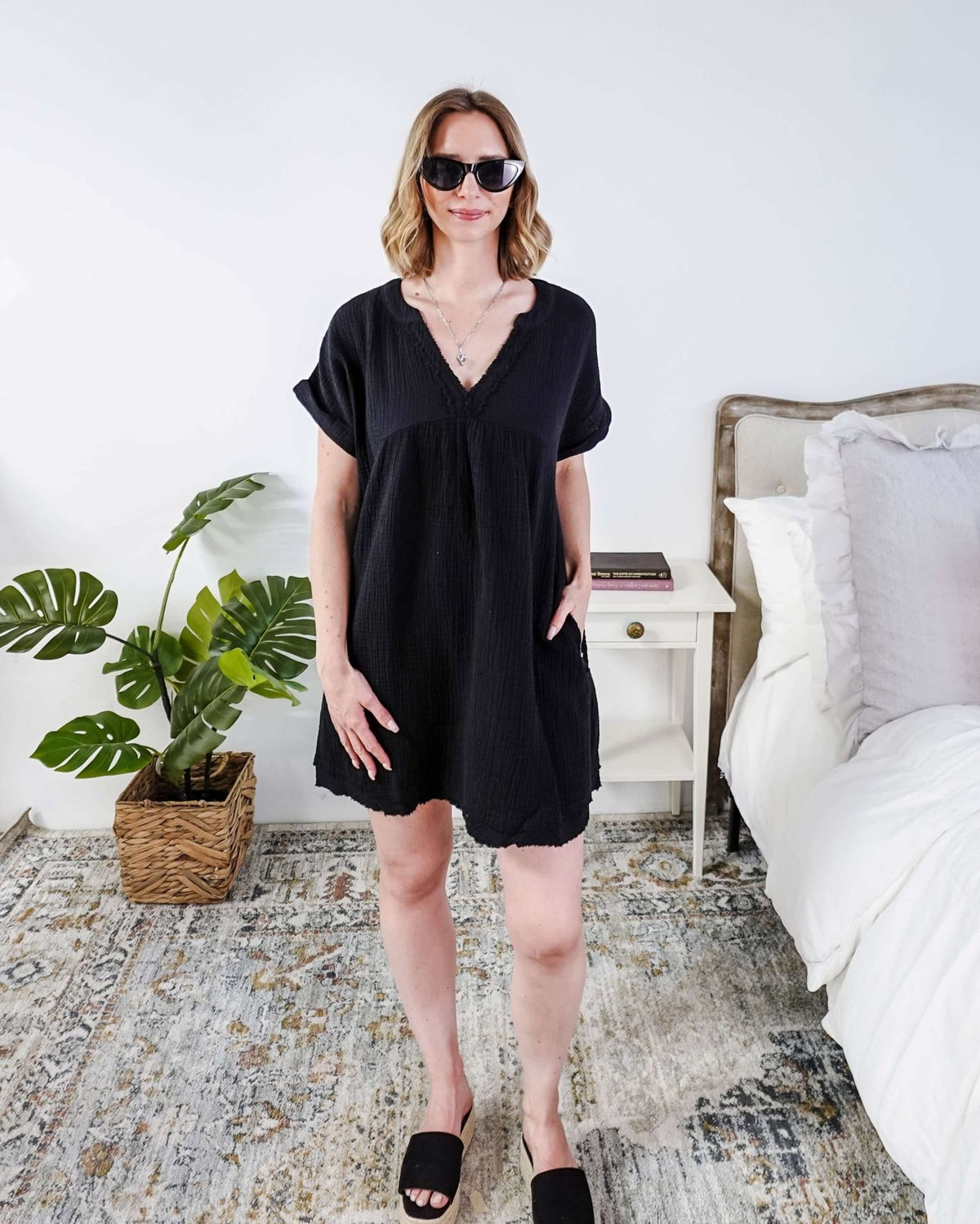 women in light weight gauze cotton black dress Scarlett Ellie V-Neck Gauze Dress | Lightweight Summer Dress | Cloud Nine Pajamas showing full length on model