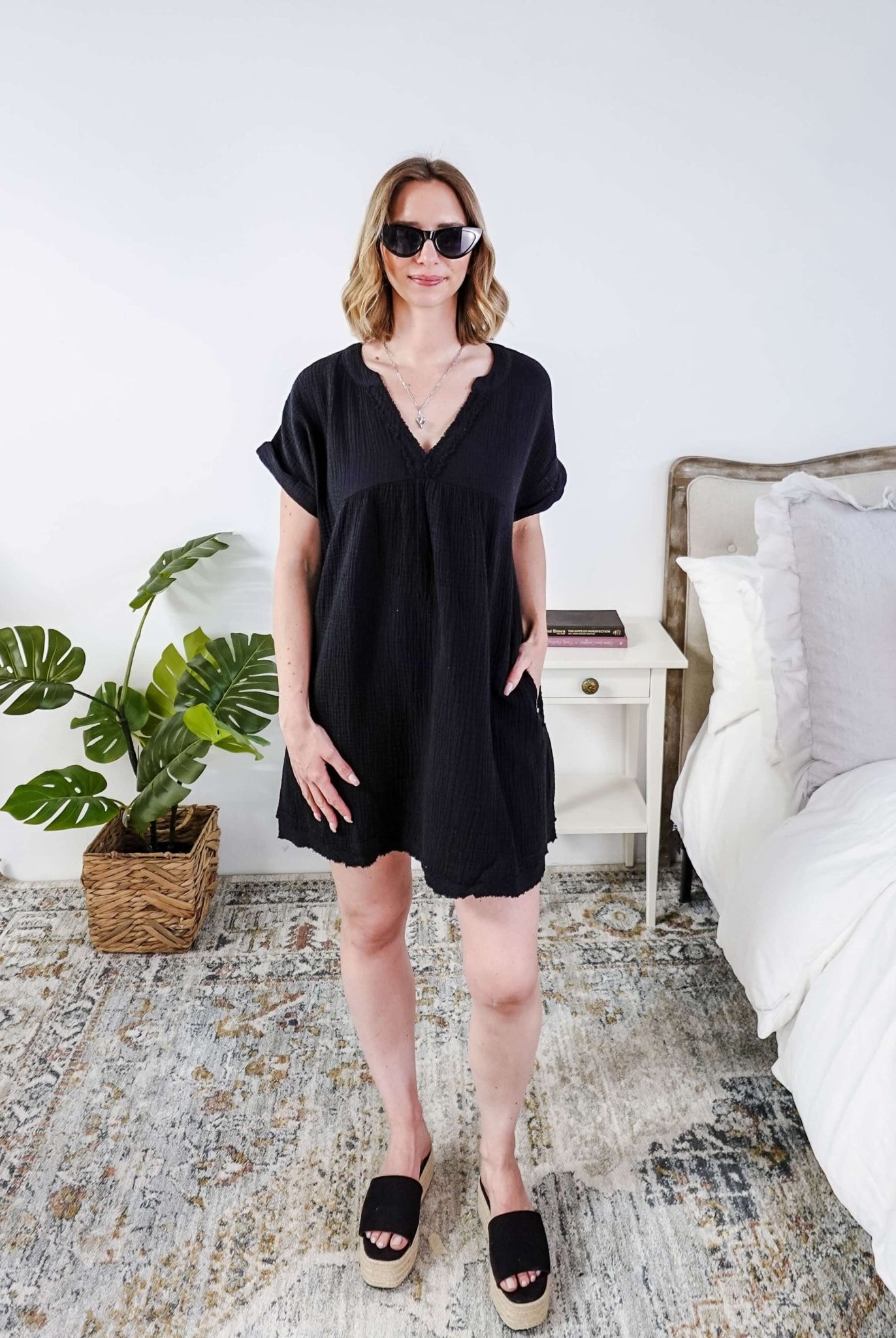 women in light weight gauze cotton black dress Scarlett Ellie V-Neck Gauze Dress | Lightweight Summer Dress | Cloud Nine Pajamas showing full length on model