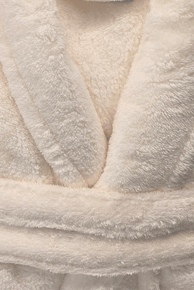 warm buddy plush robes folded showing texture cream robe