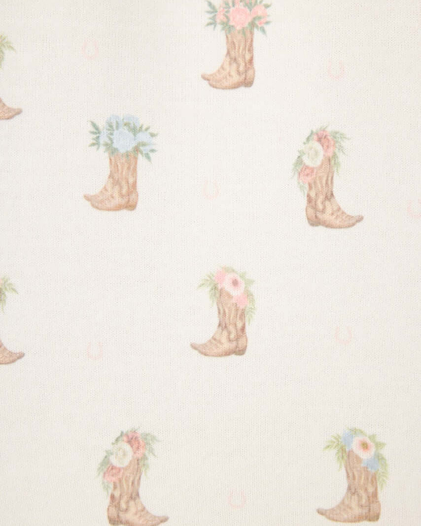 Western Blooms Boot Bouquet pattern featuring floral cowboy boots on an ivory background.