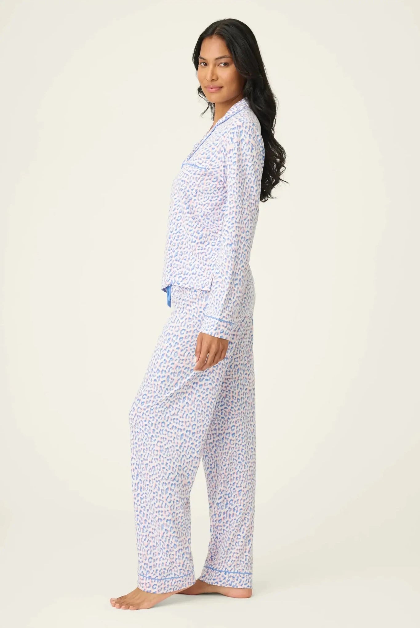 Model wearing the Whimsy Walk On The Wild Side PJ Set by PJ Salvage in playful leopard print design.