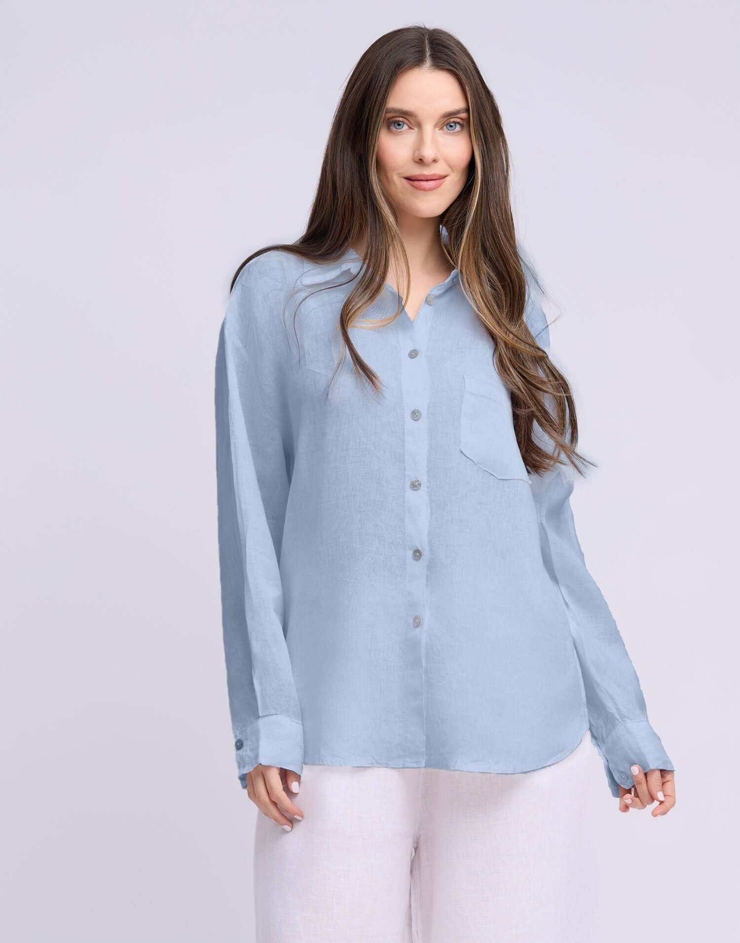 Yoga Jeans Elena Linen Oversized Button Up Top in soft blue color, featuring a relaxed fit and stylish button-up design.