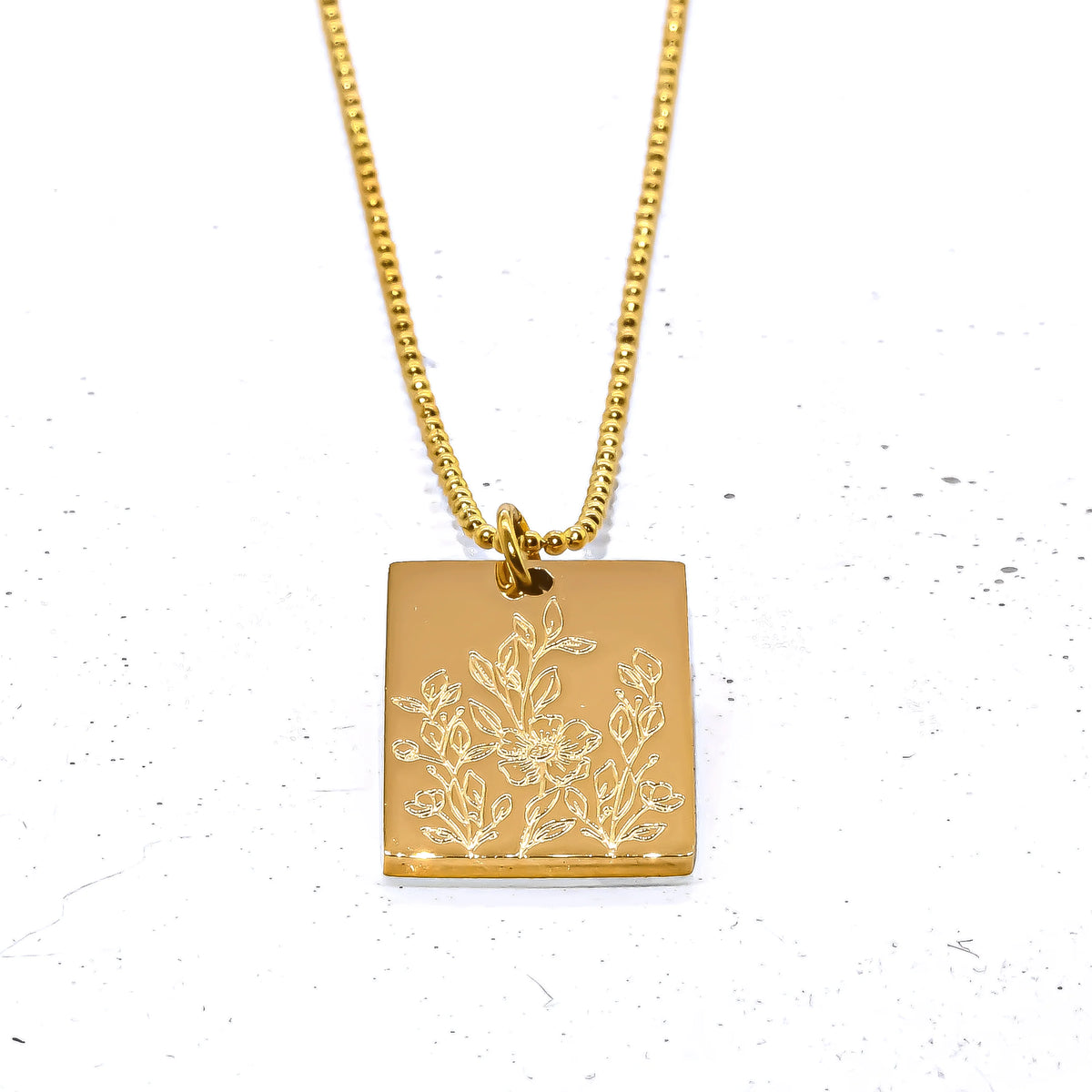 She is a Wildflower Gold Necklace
