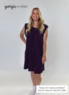 Model wearing Blackberry Amethyst Flutter Bamboo Nightgown in purple, showcasing its elegant design and comfortable fit.