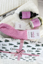 The Cuddle Bug Gift Set | Cozy Cabin Blanket, Socks & Let's Cuddle Scent Collection
