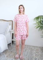 Georgia Rylan Chic Puppies Print Tee and Short Bamboo PJ Set front view on model with shirt untucked — Cloud Nine Pajamas Edmonton