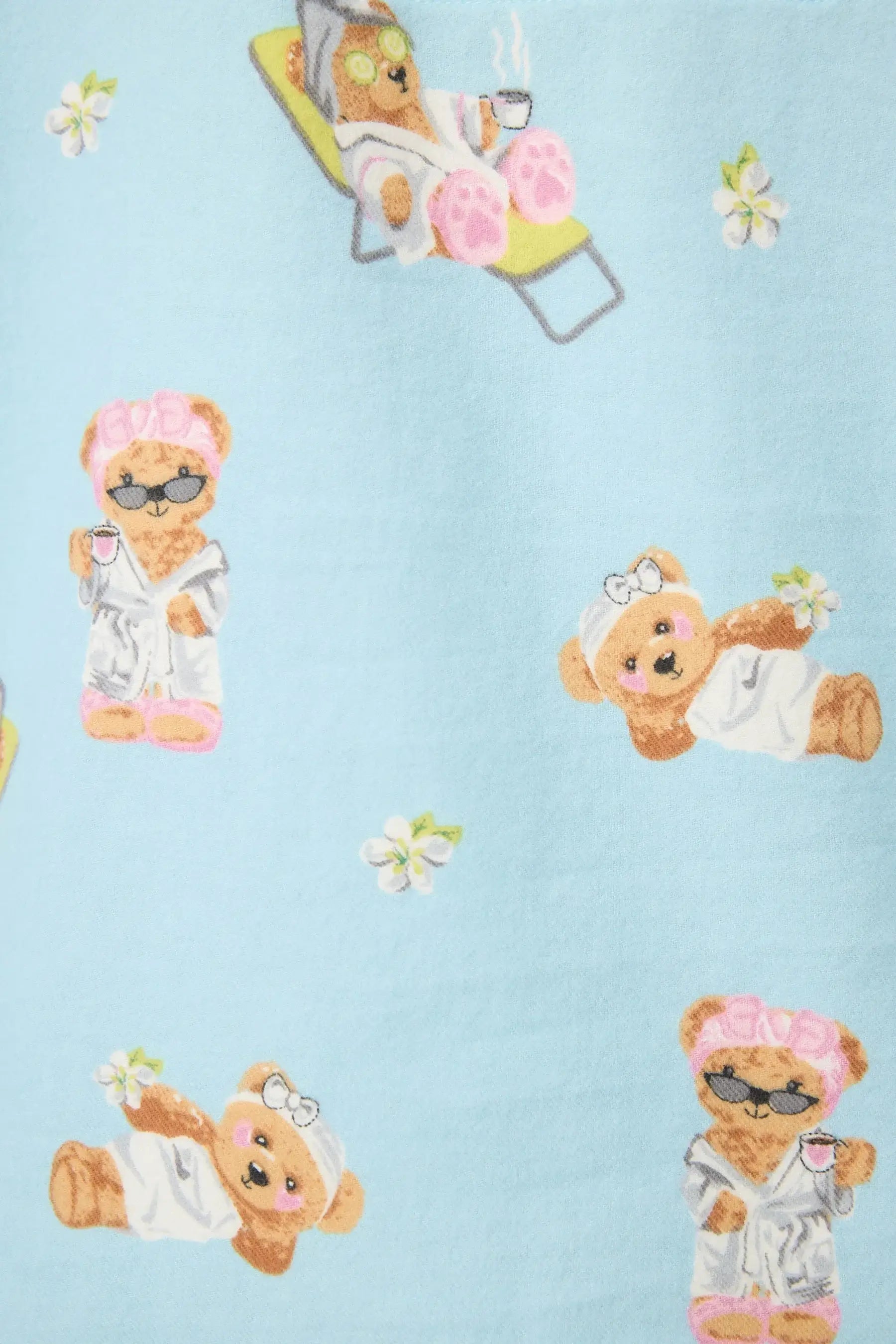 Beary Cute Bear print featuring adorable bears in spa attire on a blue flannel fabric for the Beary Cute Bear PJ Set.