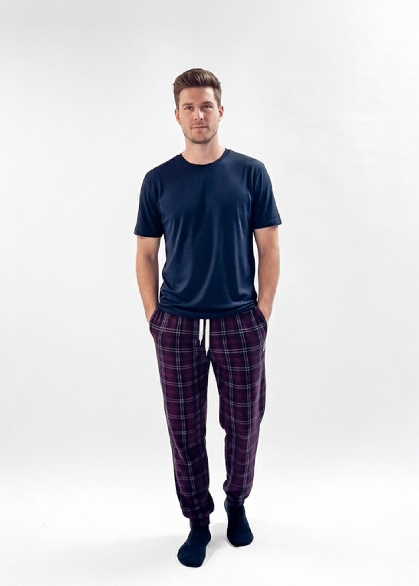 Bob's Sleepwear Co. Dark Red Plaid Bamboo Sleep Jogger Pant front view on model — Cloud Nine Pajamas Edmonton