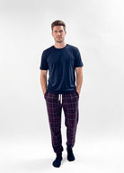 Bob's Sleepwear Co. Dark Red Plaid Bamboo Sleep Jogger Pant front view on model — Cloud Nine Pajamas Edmonton