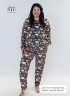 plus size woman wearing book club print velour lounge set with jogger 
