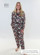 Model wearing Book Club Café Long Sleeve Jogger Velour Lounge Set by MIRANDA NIC in a cozy setting.