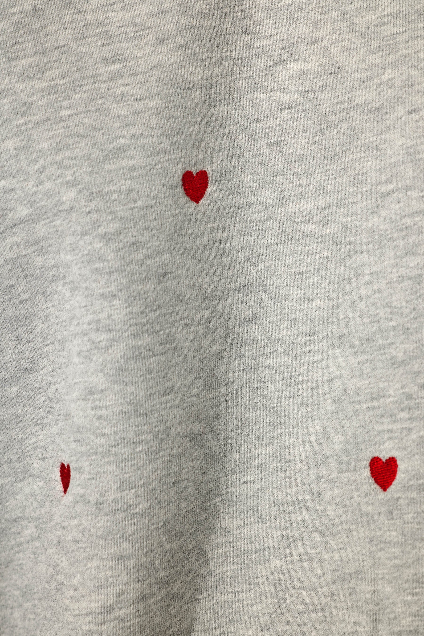 PJ Salvage C'est La Vie Hearts sweatshirt model close-up red heart embroidery detail — Cloud Nine Pajamas