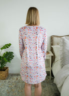 Full length back view on a model of the Miranda Nic women's purple velour long sleeve nightshirt sleep dress featuring Catwalk Kitties print - Cloud Nine Pajamas.