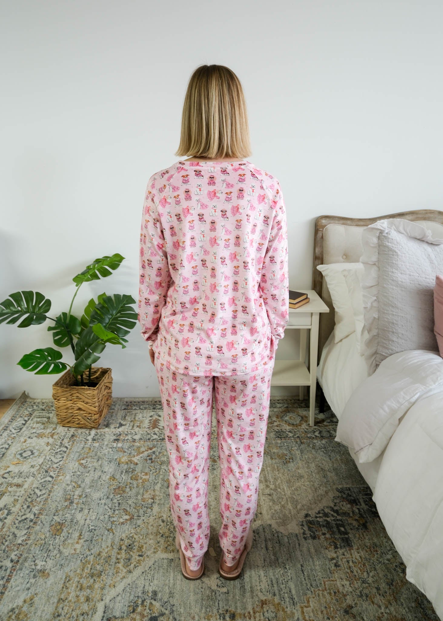 Back view on model of Miranda Nic women's pink velour long sleeve top and jogger pants loungewear set featuring Chic Puppies dog print - Cloud Nine Pajamas