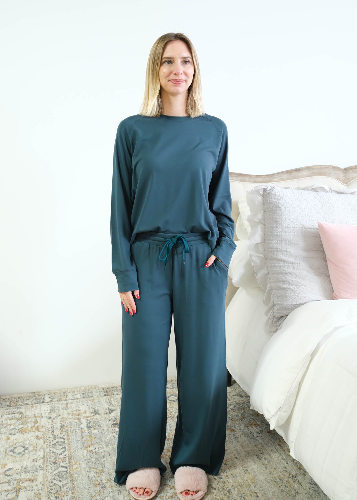 Miranda Nic Cloud Soft Teal Lounge Set model tucked front showing pocket — Cloud Nine Pajamas Edmonton